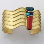 18k yellow gold bracelet with turquoise and lapis. Native American jewelry artist Darryl Dean Begay draws on his culture’s tradition of setting coral with turquoise, but with a contemporary twist. Photo courtesy of the artist, Darryl Dean Begay.